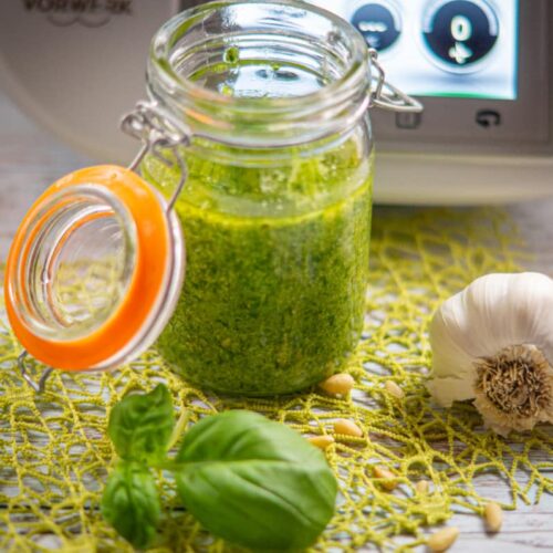 Freshly made basil pesto in a screw-top jar, prepared with the Thermomix®