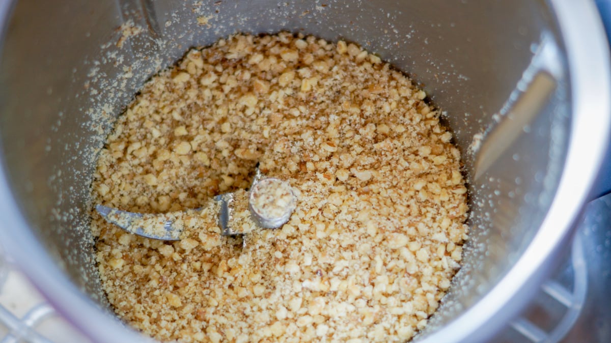 Chopped nuts in the Thermomix® mixing bowl for nut corners