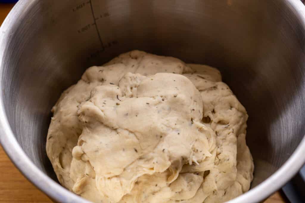 Kneading yeast dough in the mixing bowl