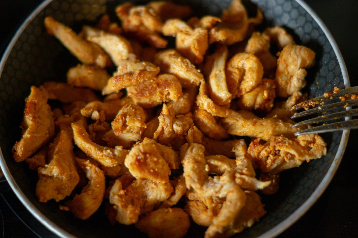 Chicken breast fillet in the frying pan