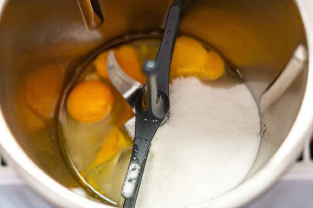 Whipping eggs and sugar until fluffy