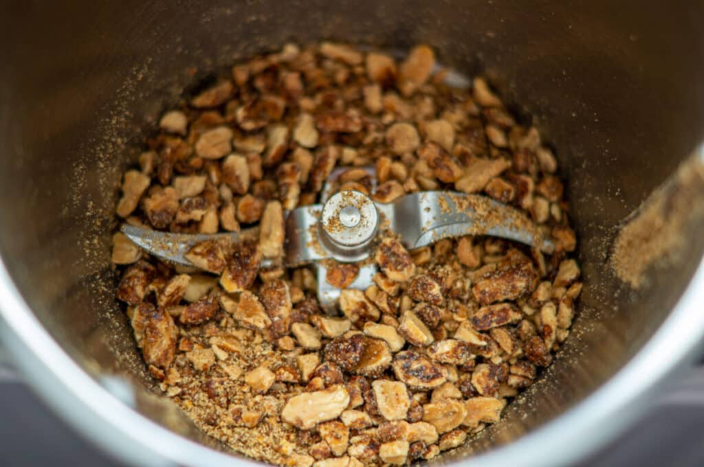 Chopping candied almonds in the mixing bowl