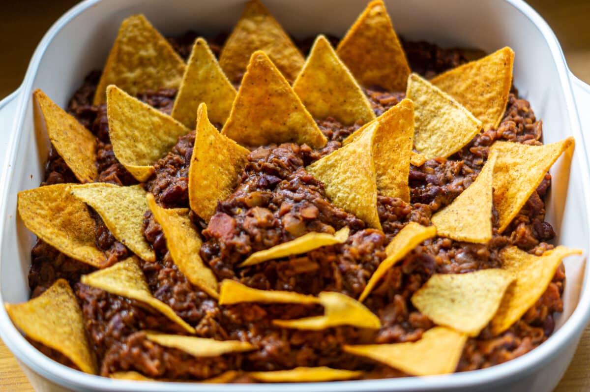 Nachos with beef mince in a baking dish