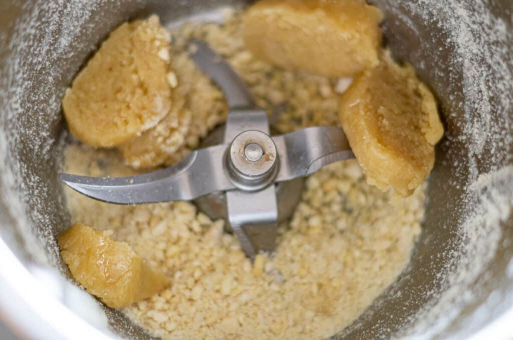 Mixing almonds, marzipan and rum in the Thermomix® mixing bowl