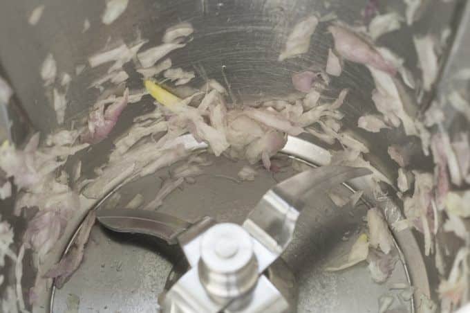 Coconut Milk Curry with Halloumi, Thermomix® 6 Chopping shallots in the Thermomix®