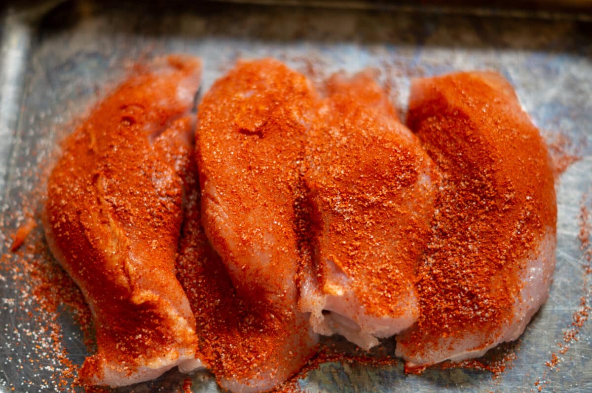 Seasoning the chicken fillets