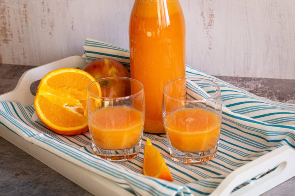 Ginger orange shot made with the Thermomix® in a glass