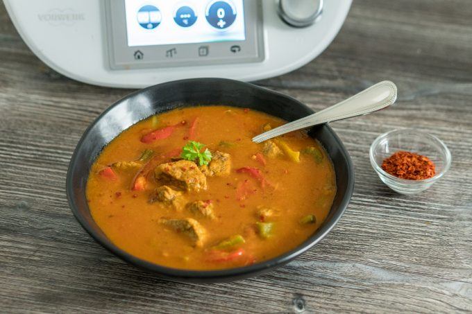 Goulash soup made with the Thermomix® scattered with chilli flakes