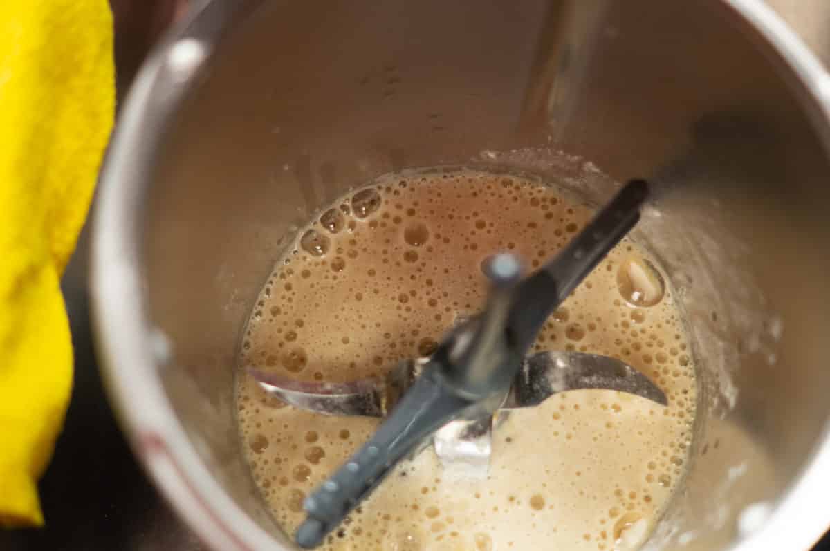 Flour, sugar and wheat beer being mixed in the Thermomix® mixing bowl to make liquid yeast