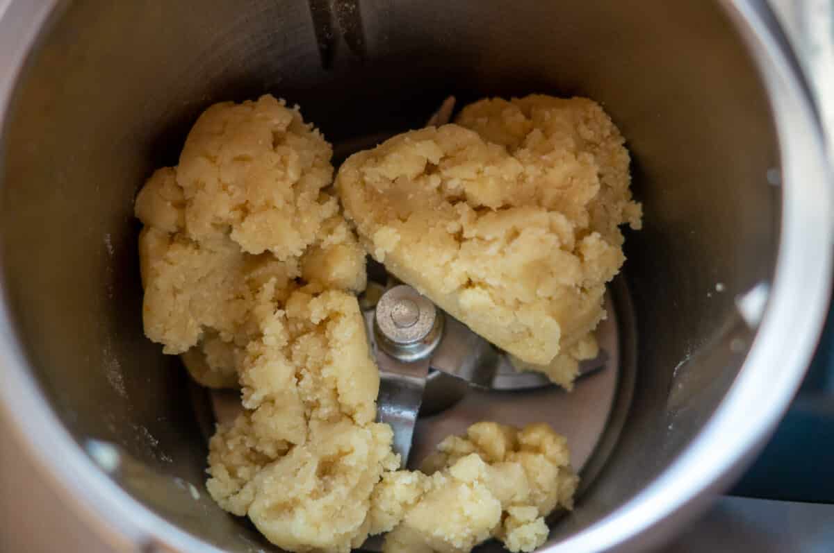 The Thermomix® mixing homemade marzipan in the mixing bowl