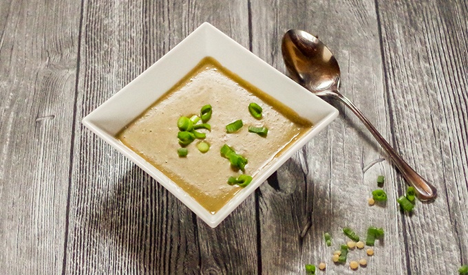 Lentil Coconut Soup with the Thermomix® in a bowl garnished with spring onion rings