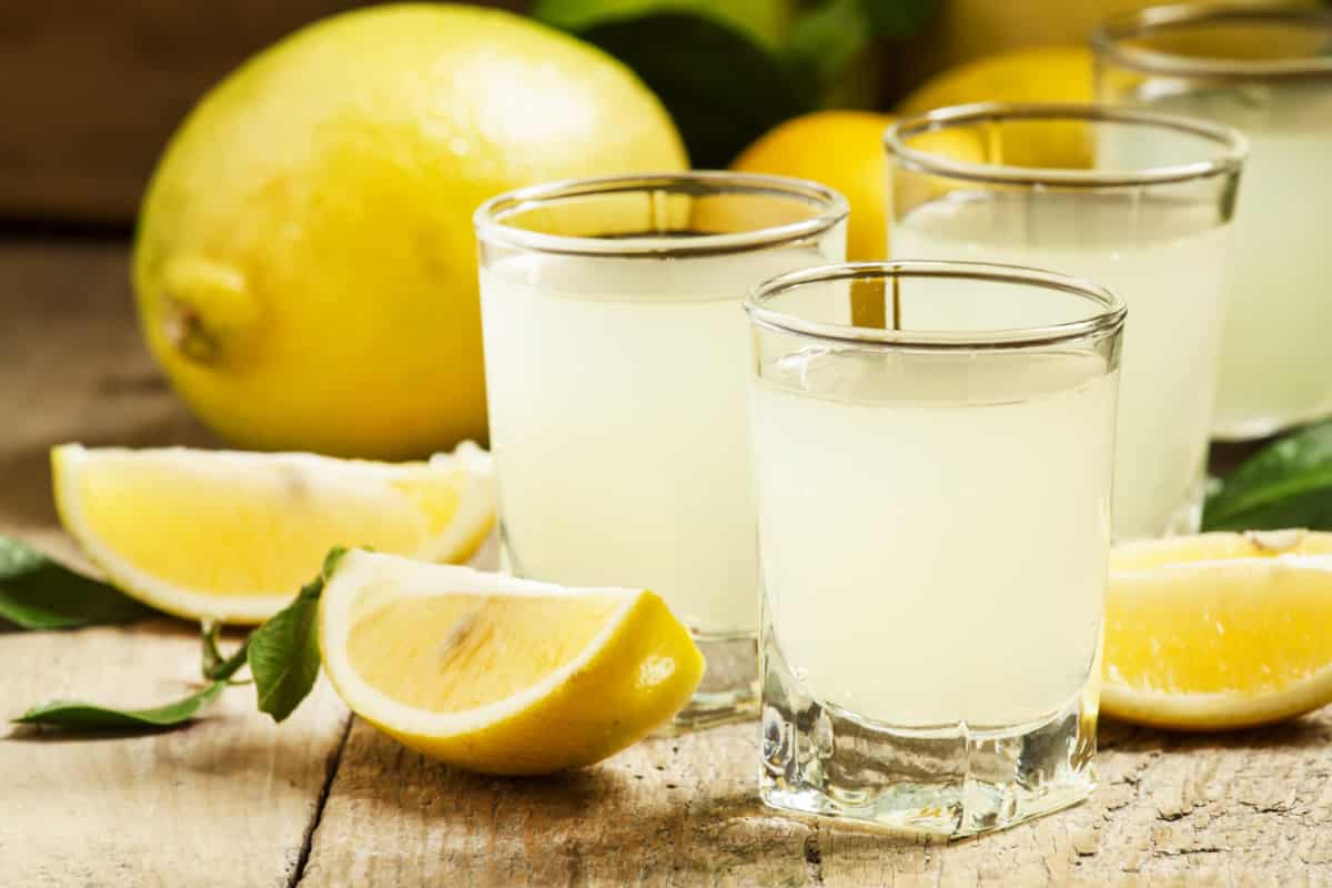 Limoncello made with the Thermomix® in a bottle and in a glass, ice-cold