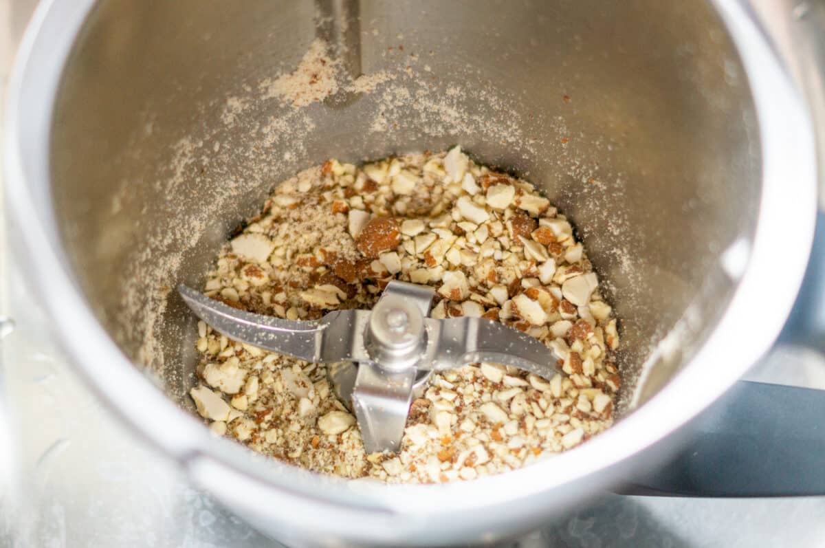 Almonds being roughly chopped in the Thermomix® mixing bowl