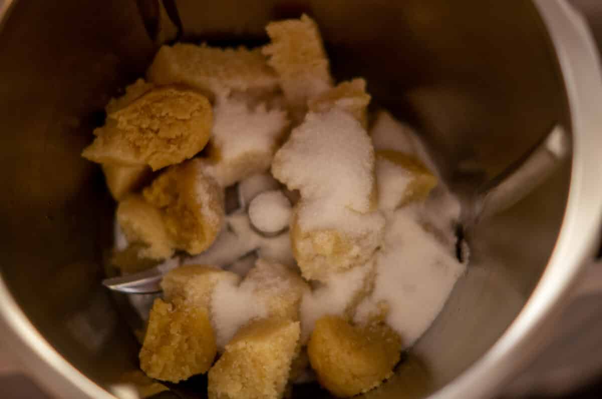 Sugar and marzipan dry in the Thermomix® mixing bowl before the cream is added