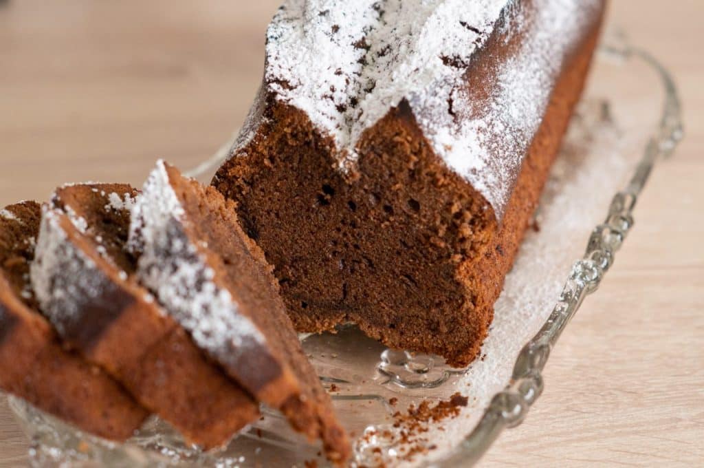 Whole chocolate cake made with the Thermomix® on a wire rack, fresh from the oven