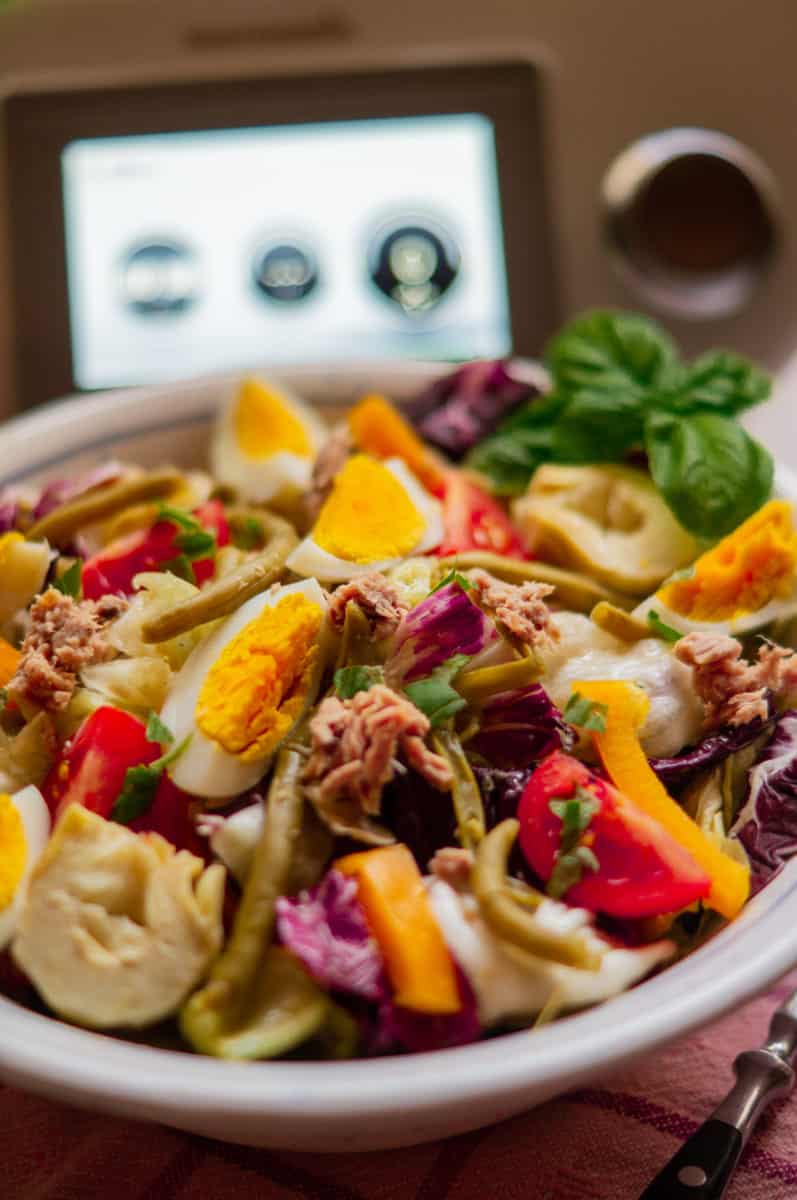 Homemade Nicoise Salad made with the Thermomix® with quartered eggs as garnish
