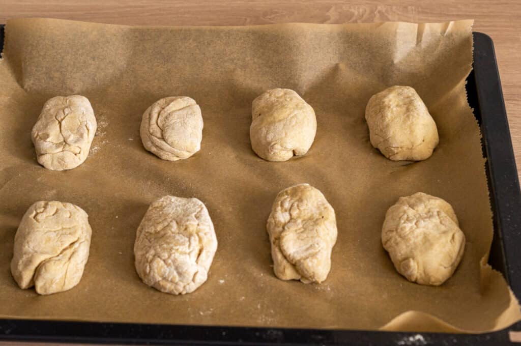 Potato rolls on a baking tray
