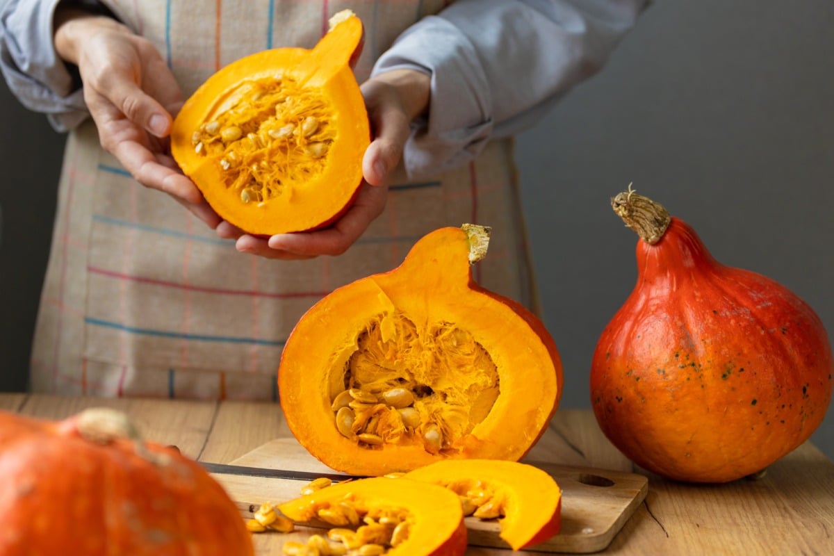 Pumpkin Vegetable Side Dish with the Thermomix® 4 Hokkaido pumpkin cut into cubes on a chopping board