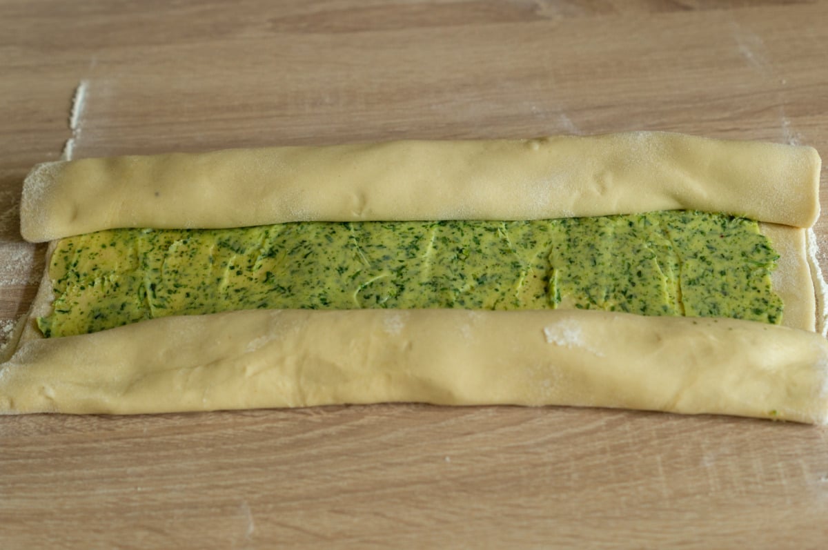 Rolling up the bread with herb butter