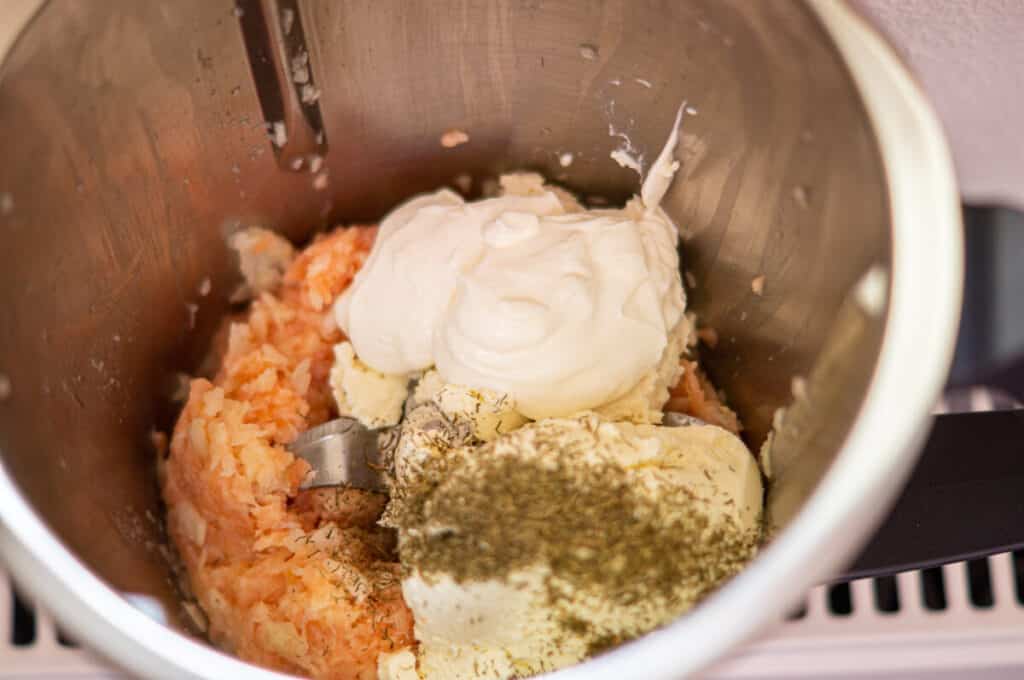 Smoked salmon spread ingredients in the mixing bowl