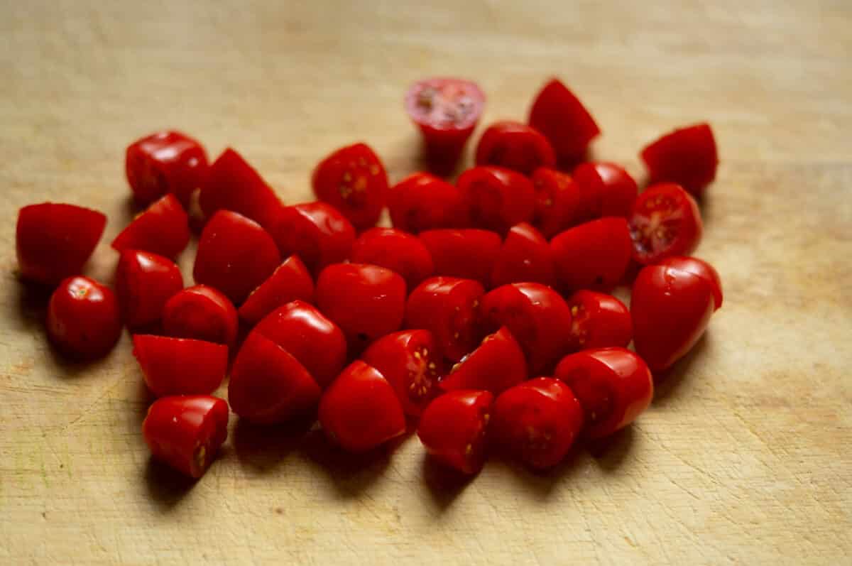 Washing and halving cherry tomatoes