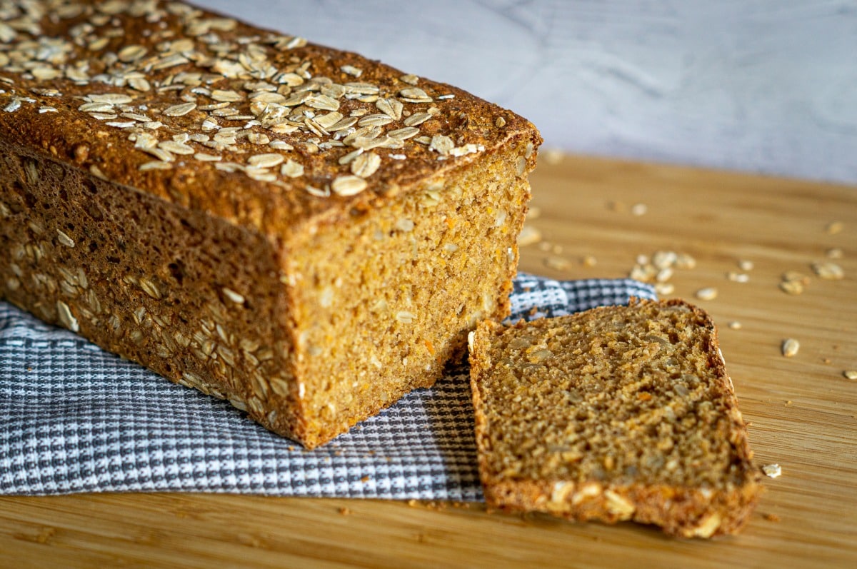 Home-baked spelt and carrot bread in a loaf tin