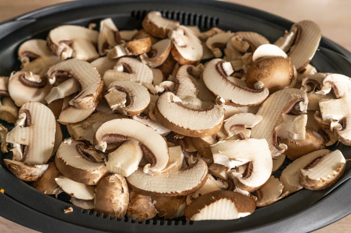 Button mushrooms steaming in the Varoma® steaming basket