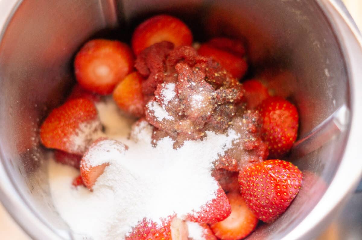 All ingredients for strawberry ketchup in the mixing bowl