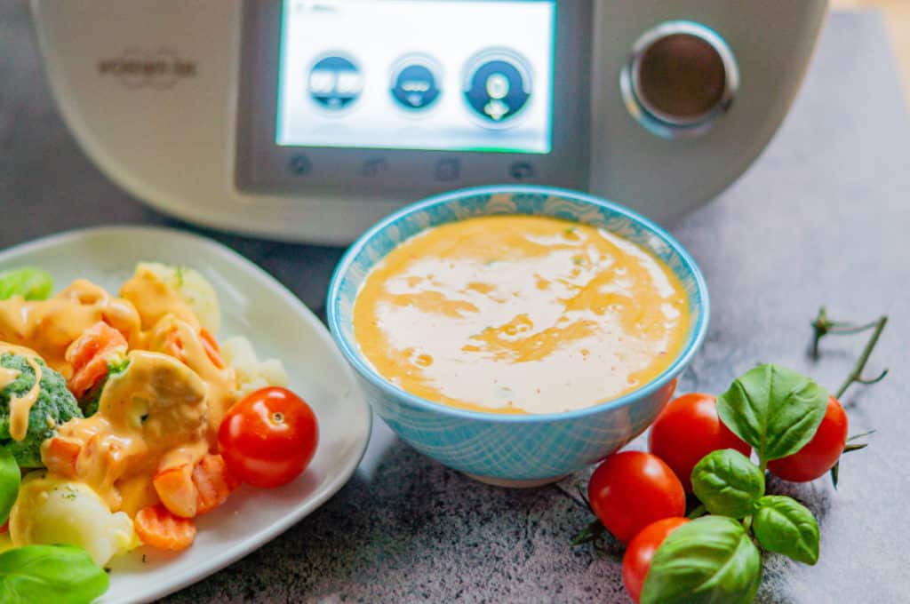 Tomato Hollandaise with the Thermomix® in a sauce boat, creamy and pale pink