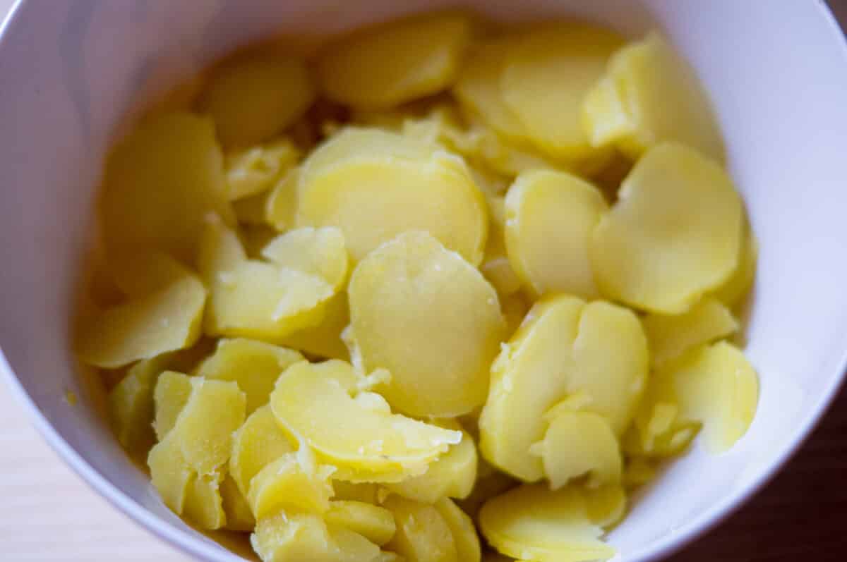 Peeling and slicing the potatoes