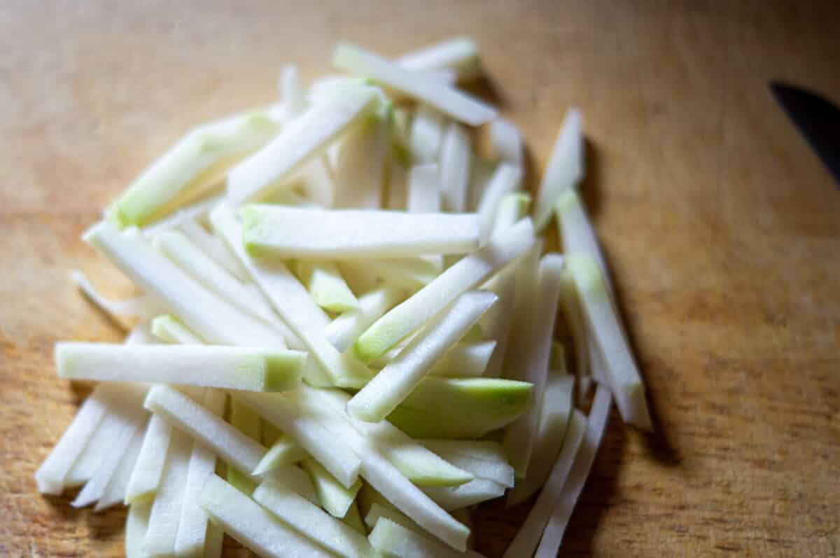 Cutting kohlrabi into sticks