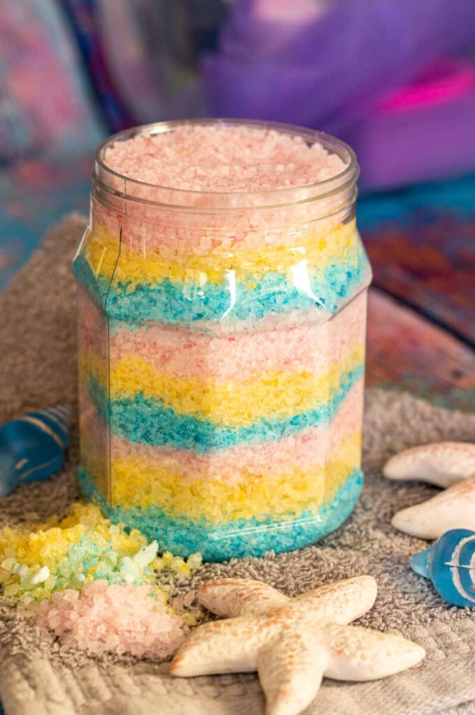 Unicorn bath salts made with the Thermomix® in colourful layers inside a jar