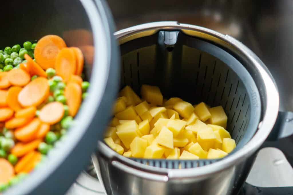 The potatoes, peas and carrots are gently steamed in the Varoma