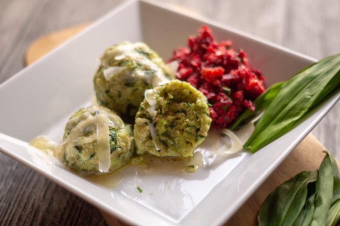 Wild garlic dumplings served with salad