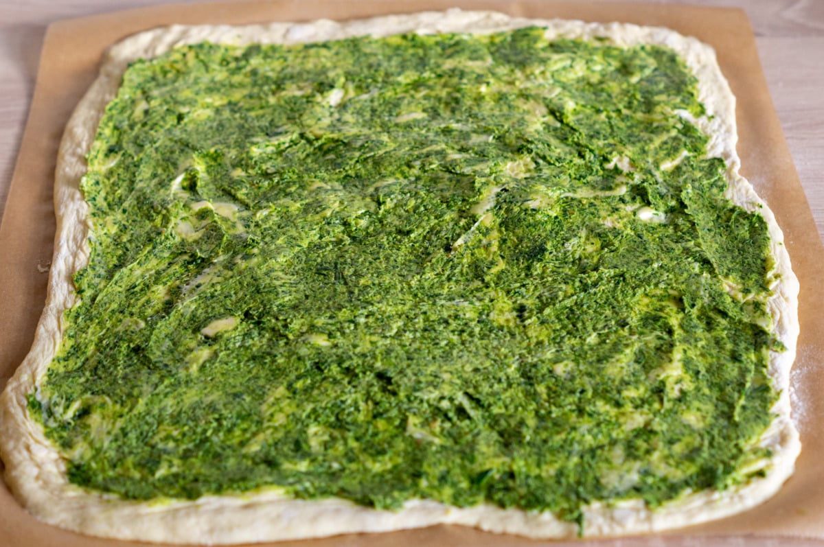 Wild garlic mixture on dough