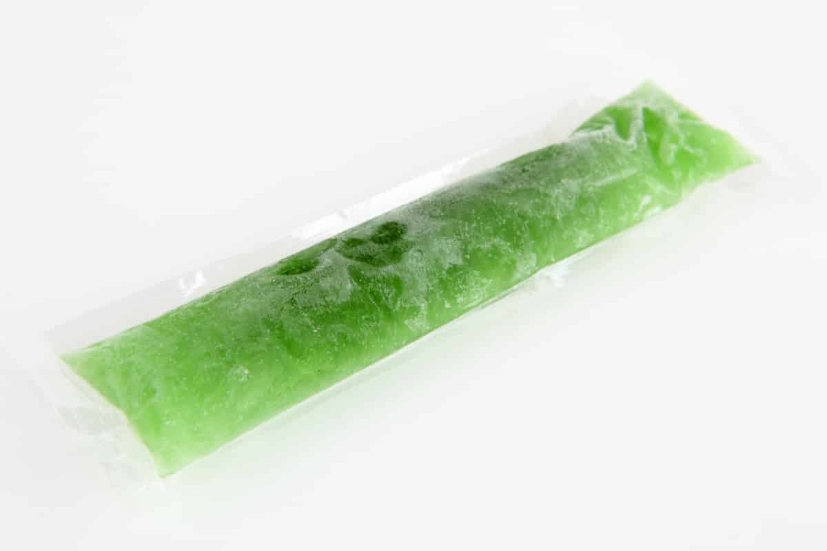 Woodruff ice lollies made with the Thermomix®, green in colour, in ice lolly moulds