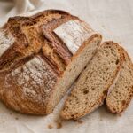 Round sourdough bread with sliced crumb